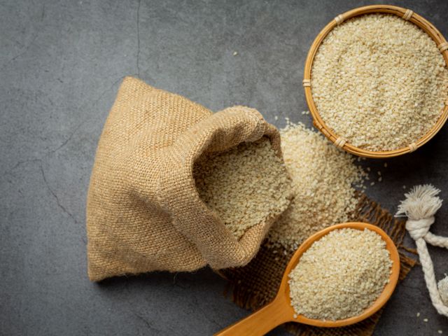 Sesame seeds on dark background